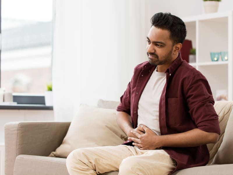 Men visiting a doctor and discussing male fertility related issues.